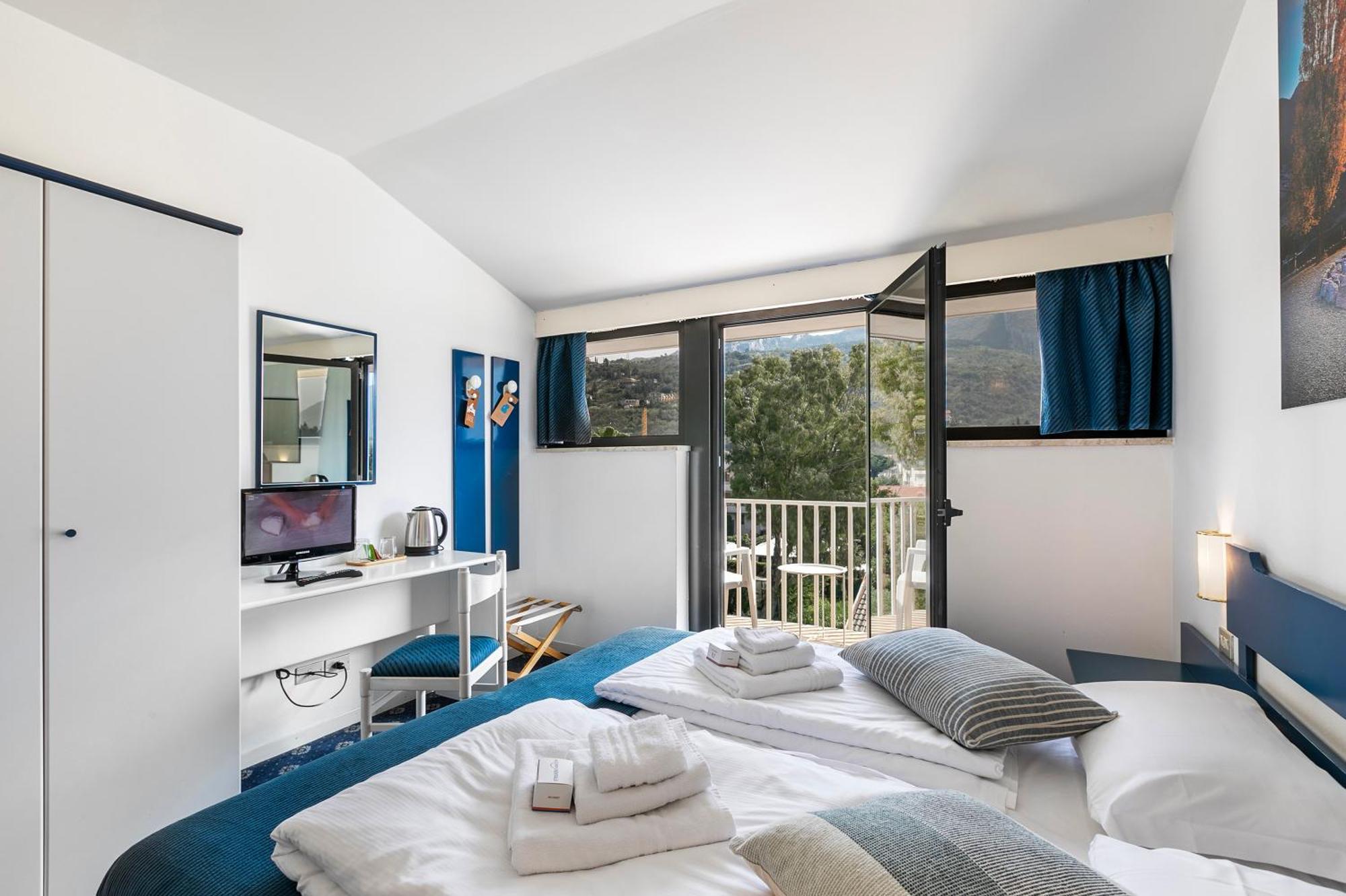 Bike & Wind Hotel Villa Maria Torbole Sul Garda Exterior foto